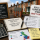 Property deal sourcing graphic with UK terraced houses, a model home, checklist, calculator and notes about adapting your tactics to changing market conditions in order to find better deals